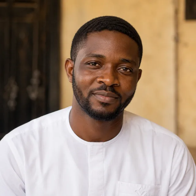 Ibrahim Suleiman, a civil engineer from Abuja, photographed in a white kaftan